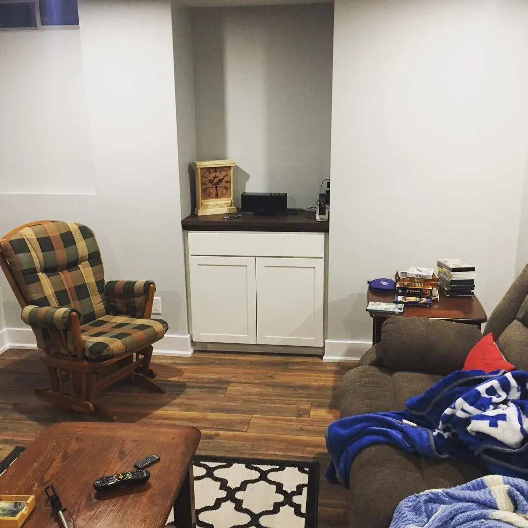 Custom basement built-in cabinet with walnut counter by Walkercraft Carpentry