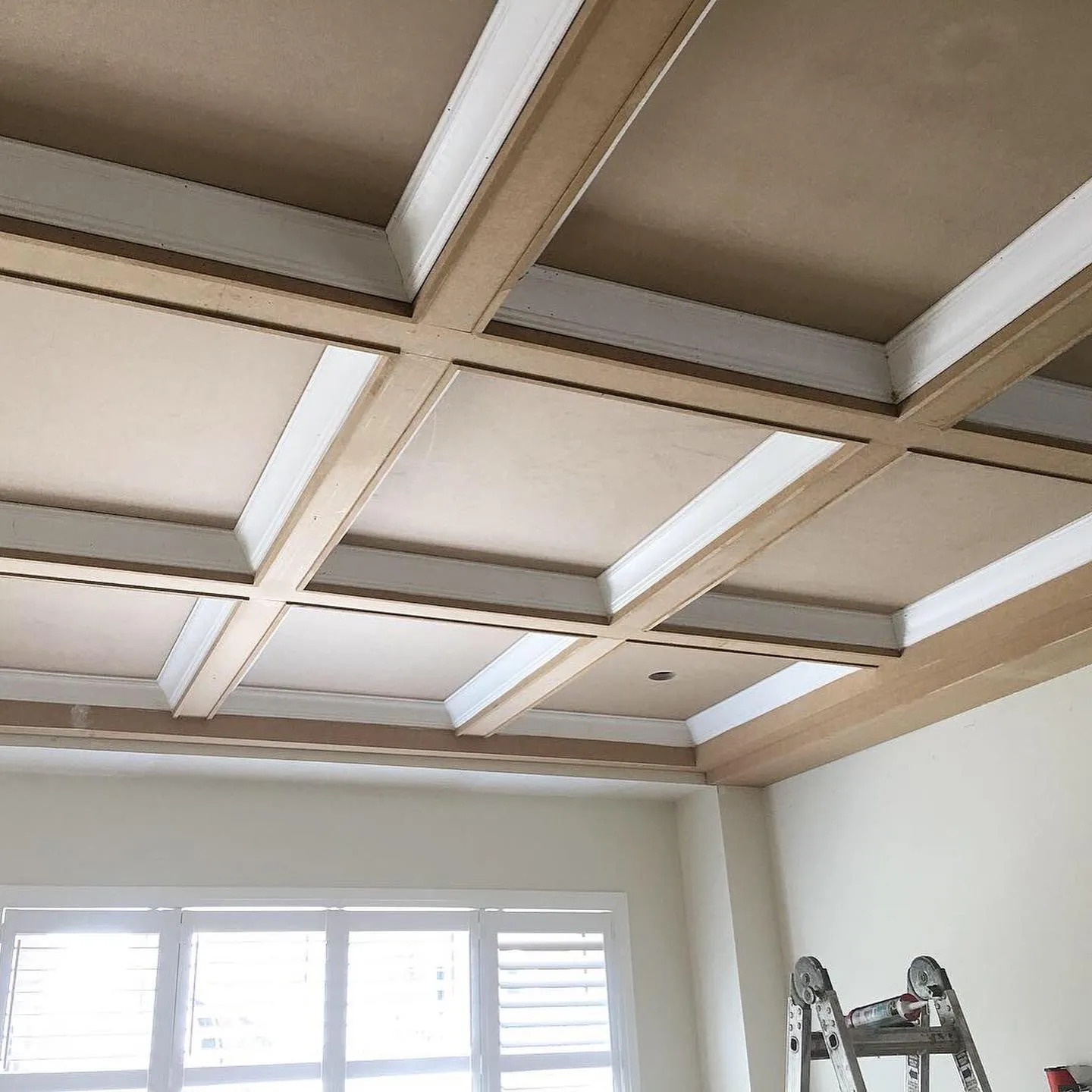 Coffered ceiling construction in progress by Walkercraft Carpentry