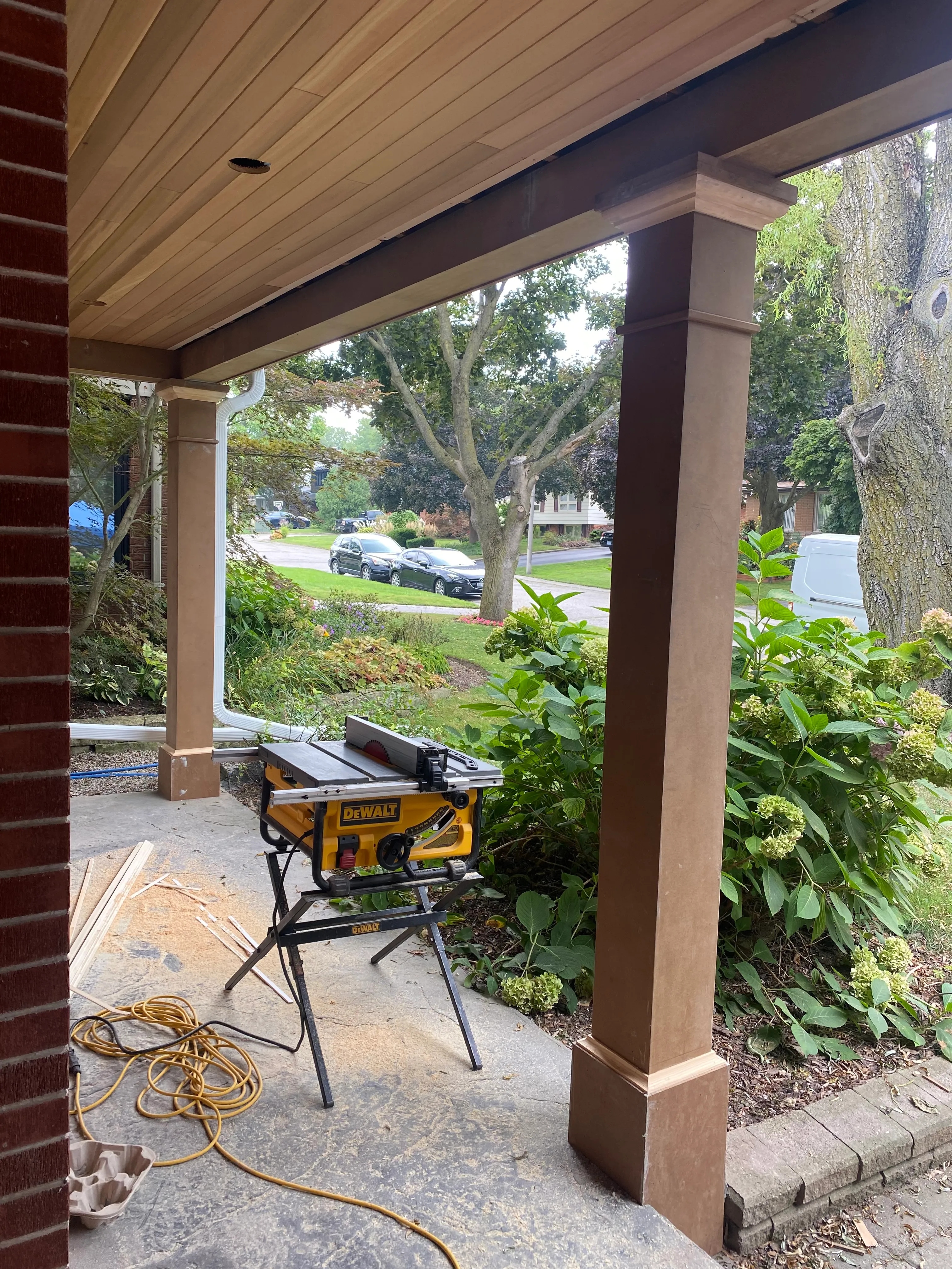 Porch column wraps and cedar soffit installation in progress by Walkercraft Carpentry