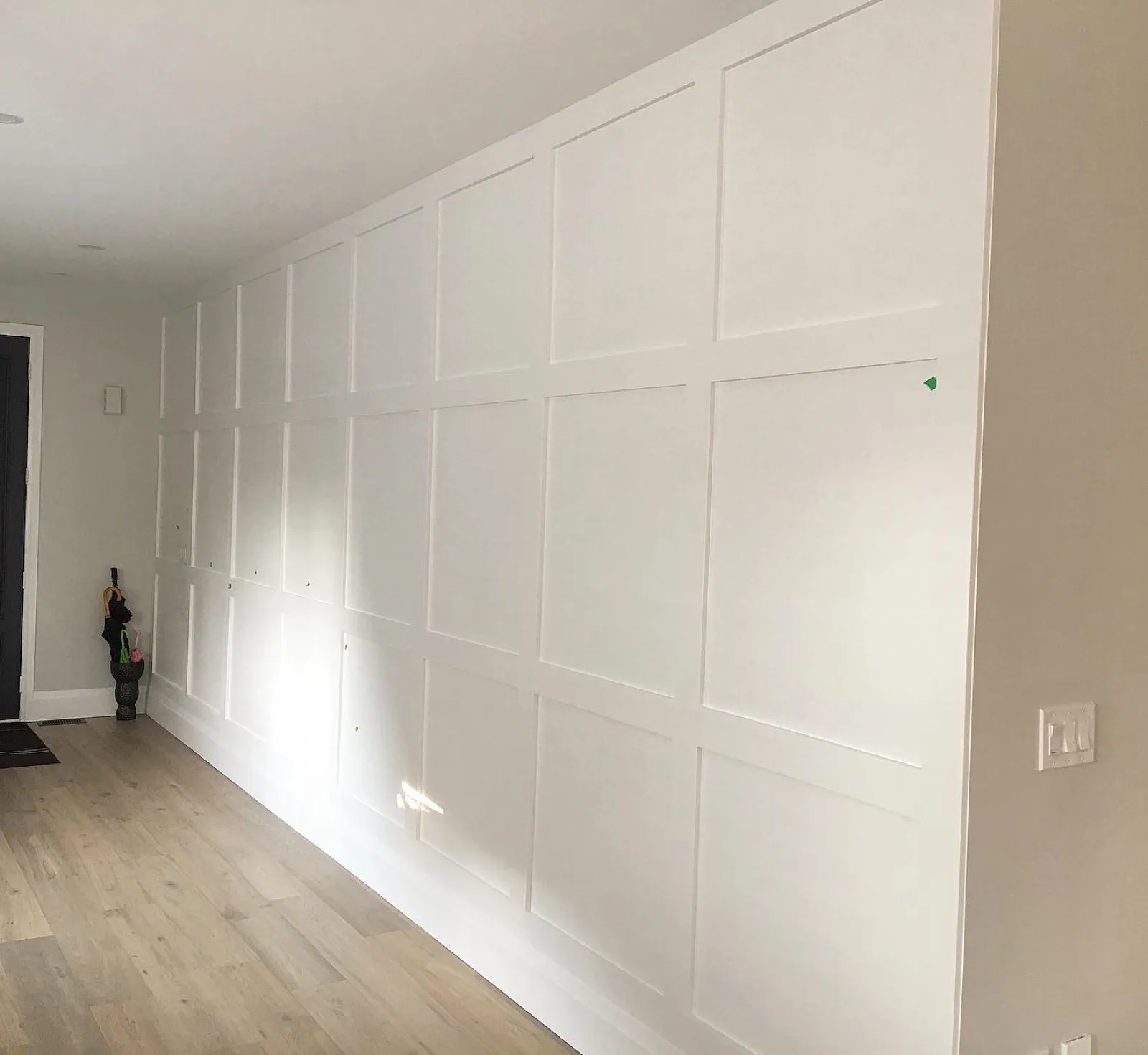 Custom wall panelling and wainscoting installed by Walkercraft Carpentry in Burlington