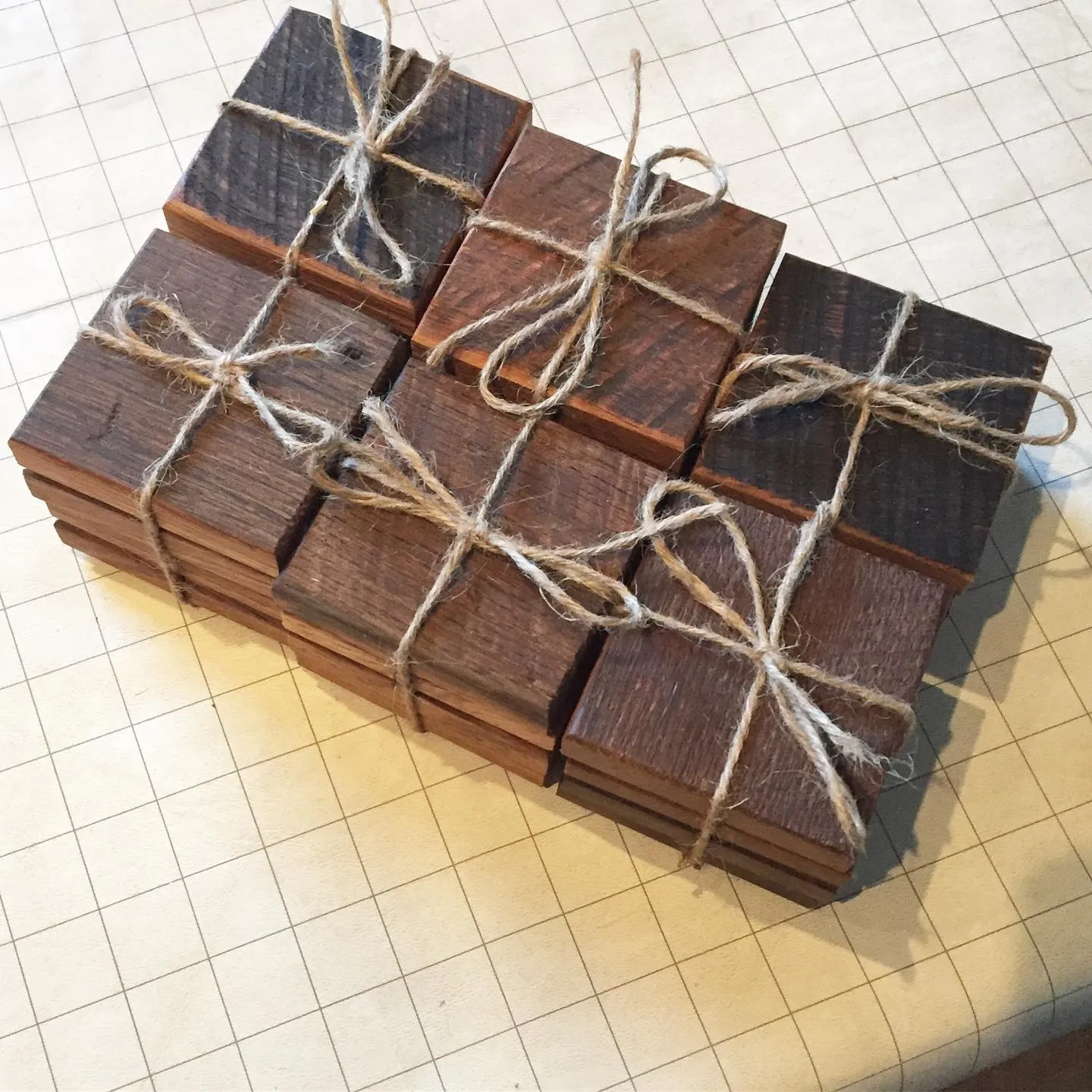 Reclaimed wood coasters tied with twine by Walkercraft Carpentry